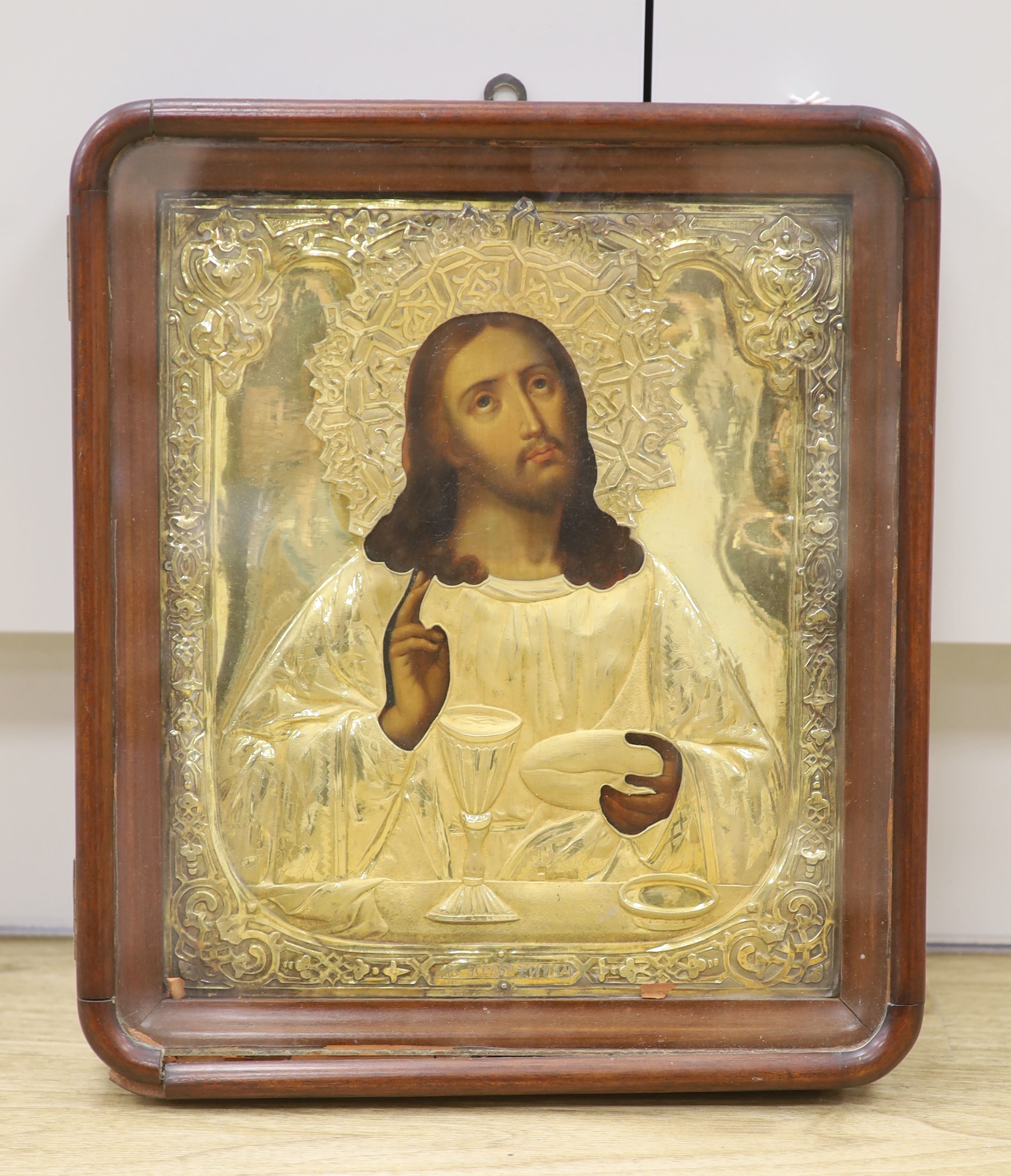 Russian School, tempera on panel, Icon of Christ with gilt oklad, 36 x 26cm, case overall 38 x 32.5cm